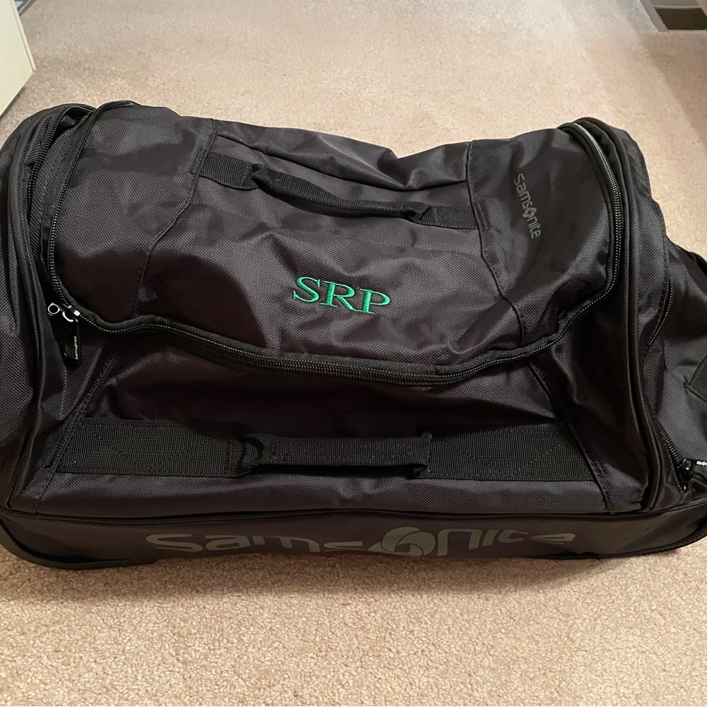 Suitcase rolling. Brand new